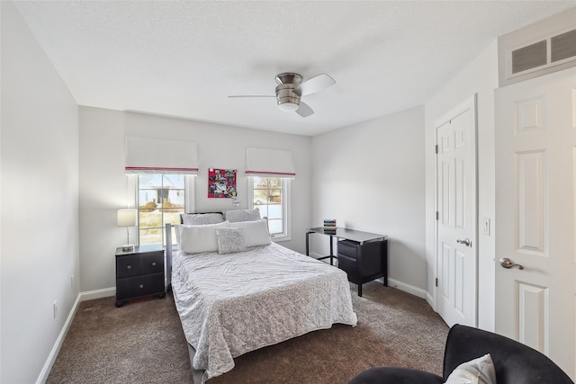bedroom with baseboards, carpet, and visible vents
