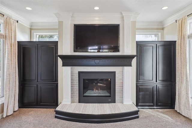 details with a fireplace, ornamental molding, carpet, and recessed lighting