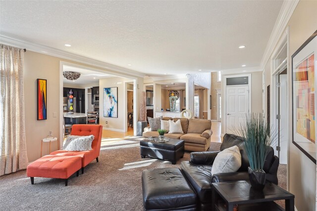 carpeted living area with crown molding and recessed lighting