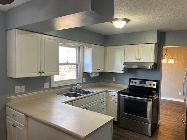 kitchen featuring white cabinets, sink, a textured ceiling, and stainless steel range with electric stovetop