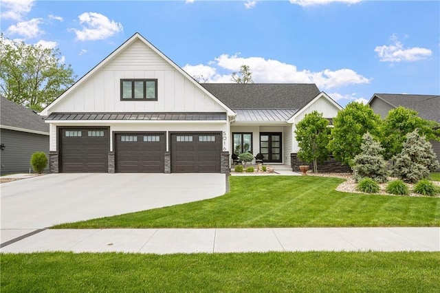 modern farmhouse style home with a garage and a front yard