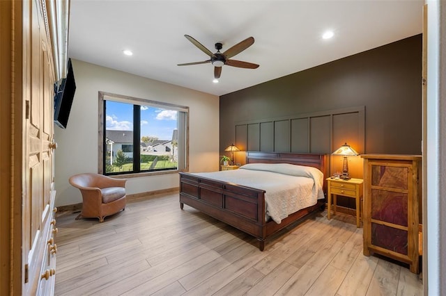 bedroom featuring ceiling fan and light wood-type flooring