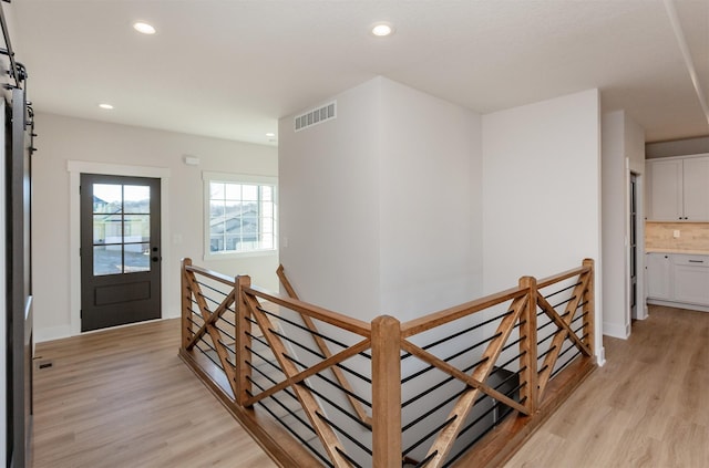 hall featuring light hardwood / wood-style flooring