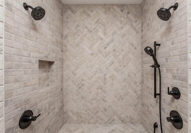 bathroom featuring tiled shower