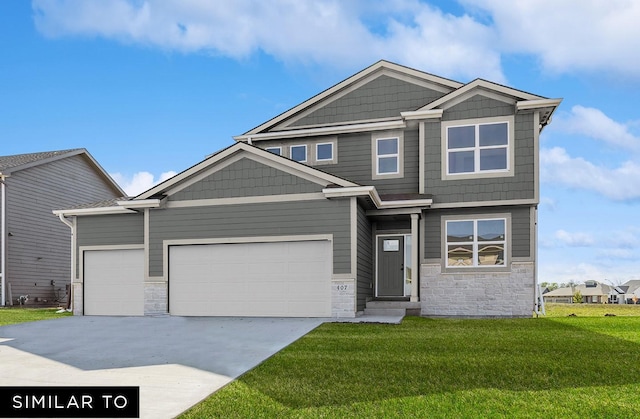 view of front of house featuring a garage and a front yard