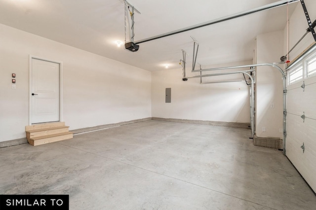 garage featuring electric panel and a garage door opener