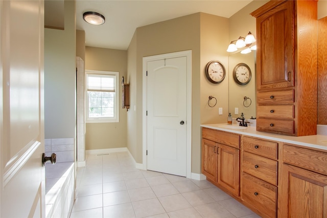 bathroom with vanity and tile patterned flooring