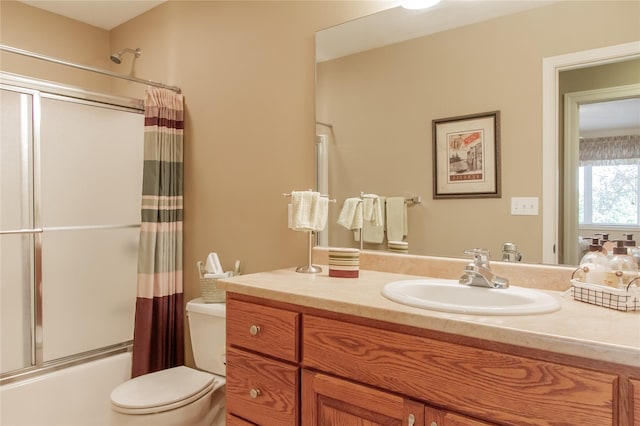 full bathroom with toilet, vanity, and shower / bathing tub combination