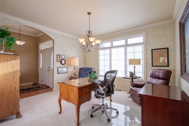 carpeted office space featuring a chandelier and crown molding