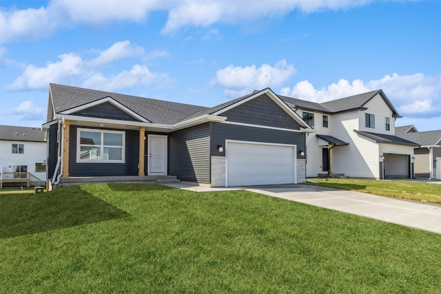 4207 NE 3rd St, Ankeny, IA 50021 - view of front facade featuring concrete driveway, a front lawn, and a garage