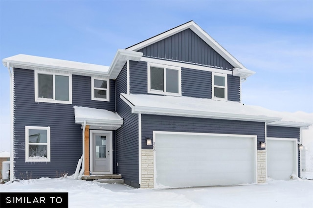 view of front of property with a garage