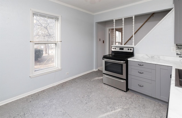 kitchen featuring stainless steel electric range, gray cabinets, and ornamental molding