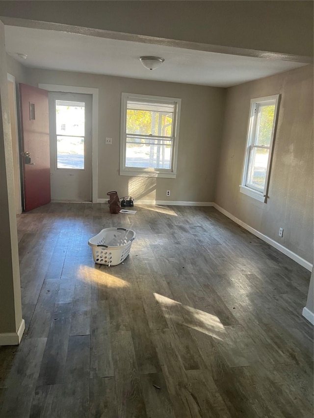 spare room featuring dark hardwood / wood-style floors