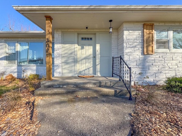 property entrance featuring a garage