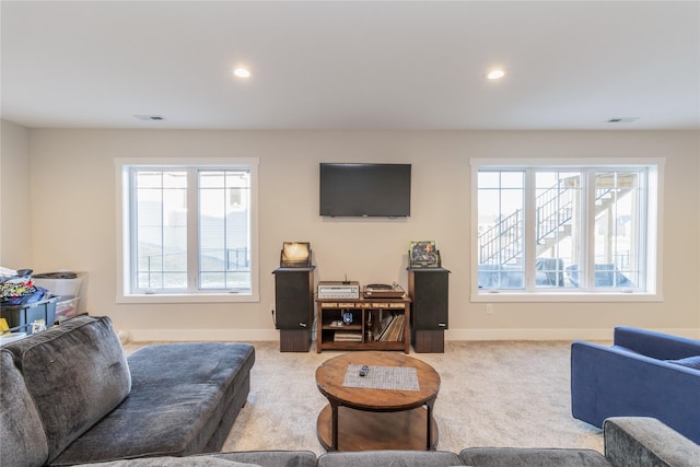 living room featuring light colored carpet