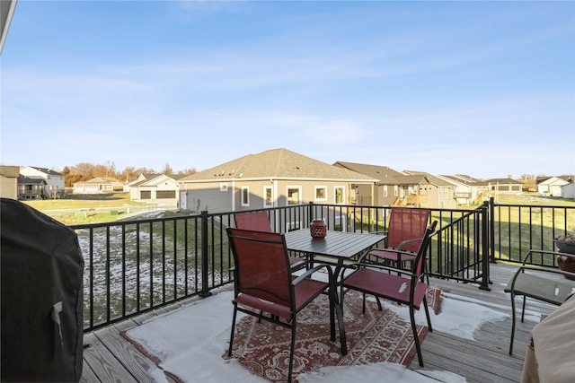 wooden deck featuring area for grilling