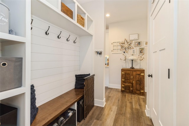 mudroom with hardwood / wood-style floors