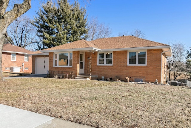 single story home featuring a front yard, a garage, and cooling unit