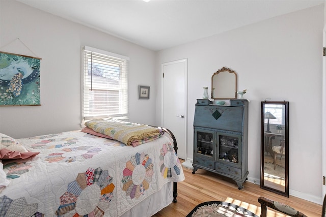 bedroom featuring light hardwood / wood-style floors