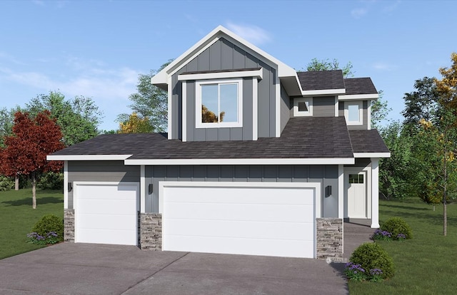 view of front of property featuring a front yard and a garage