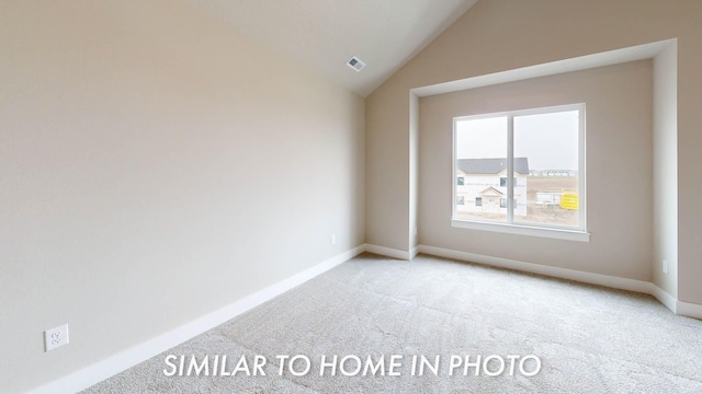 503 43rd St SW, Altoona, IA 50009 - spare room with light colored carpet, baseboards, lofted ceiling, and visible vents