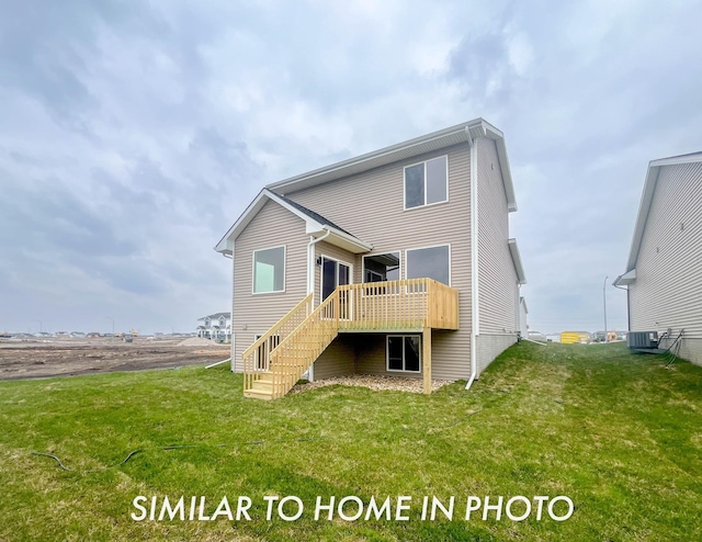 503 43rd St SW, Altoona, IA 50009 - back of property with stairs, central AC unit, a lawn, and a deck