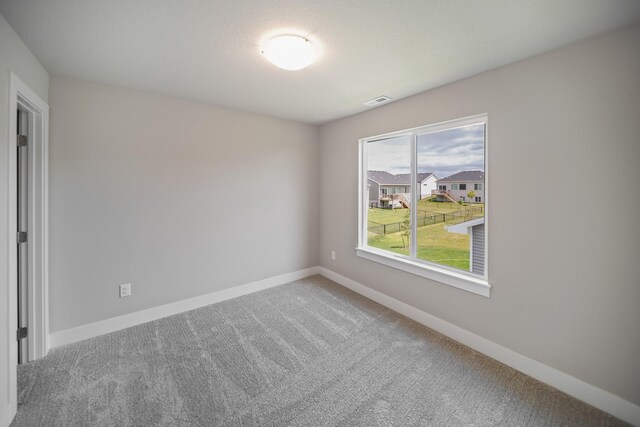 503 43rd St SW, Altoona, IA 50009 - carpeted empty room featuring baseboards