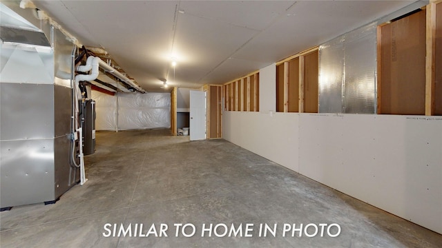 basement with heating unit and water heater