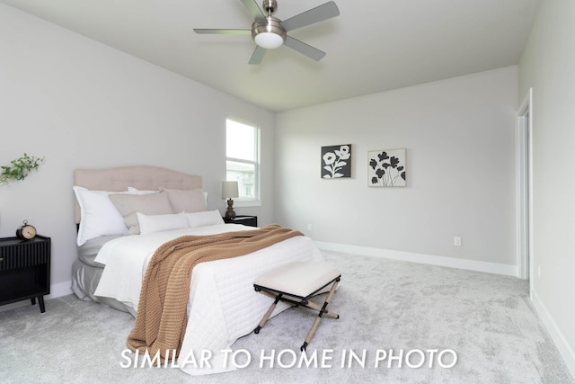 bedroom with baseboards, a ceiling fan, and carpet flooring