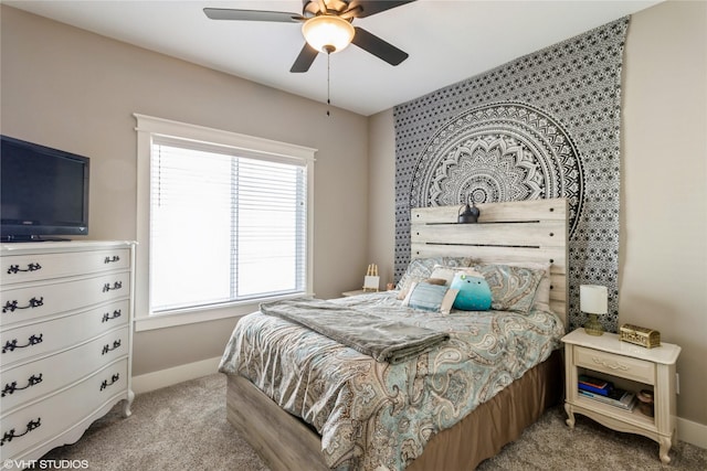 bedroom with ceiling fan and carpet flooring