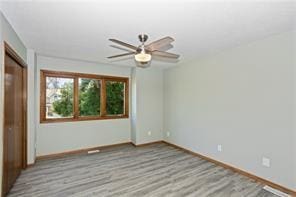 spare room with ceiling fan