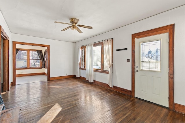 foyer featuring ceiling fan and dark hardwood / wood-style flooring