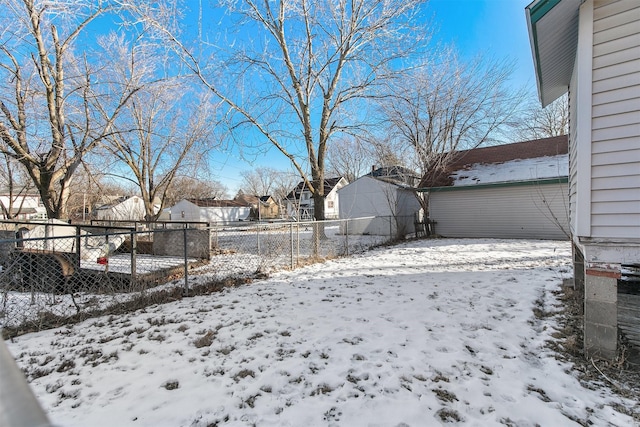 view of yard covered in snow