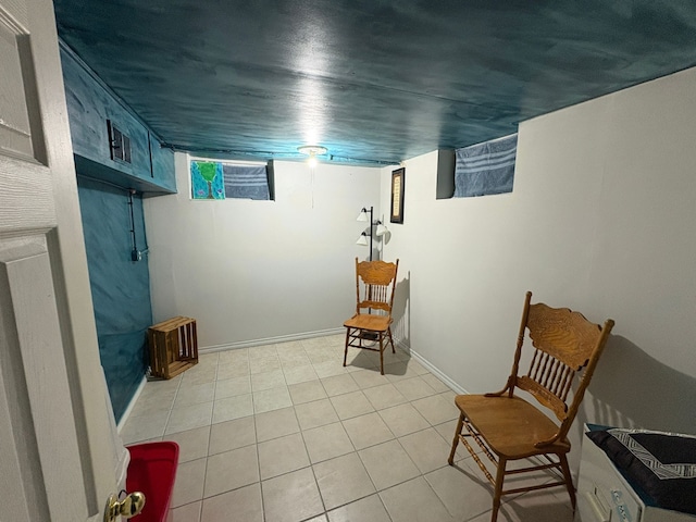 living area featuring light tile patterned flooring