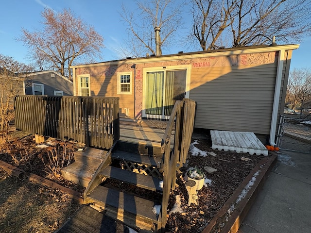 rear view of house with a deck