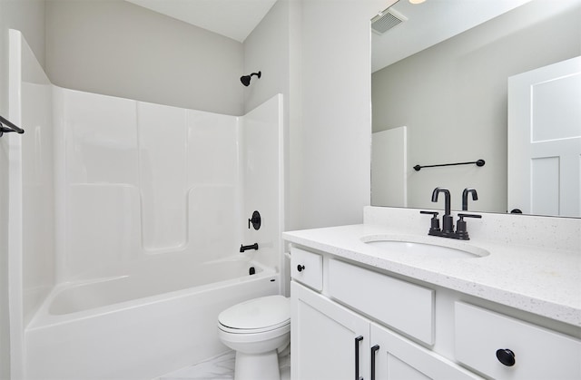 full bathroom with vanity, washtub / shower combination, and toilet