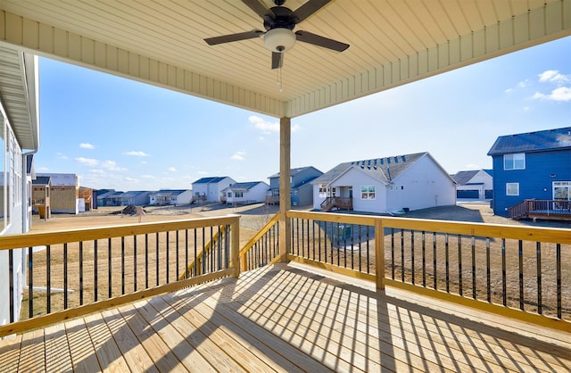 wooden deck with ceiling fan