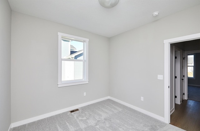 view of carpeted spare room