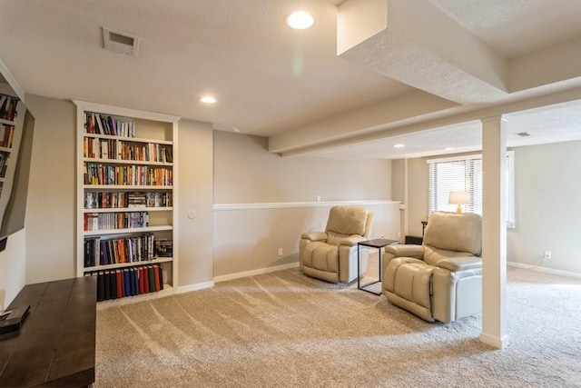 sitting room featuring carpet floors