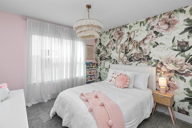 carpeted bedroom featuring a notable chandelier and multiple windows