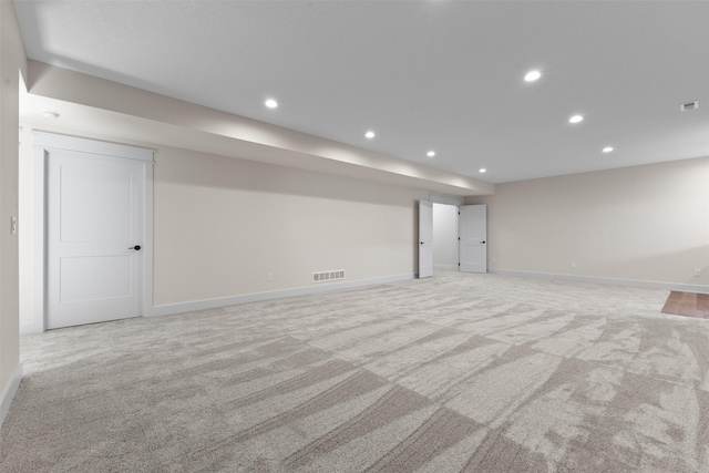 basement with light carpet