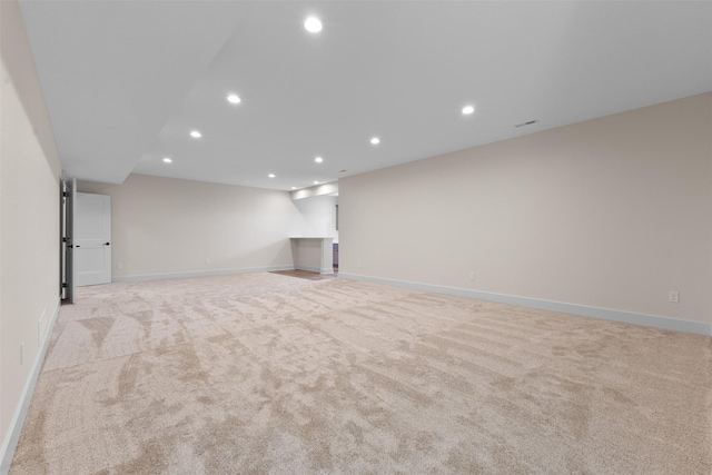 interior space featuring light colored carpet