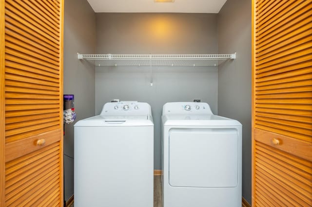 clothes washing area featuring washing machine and dryer