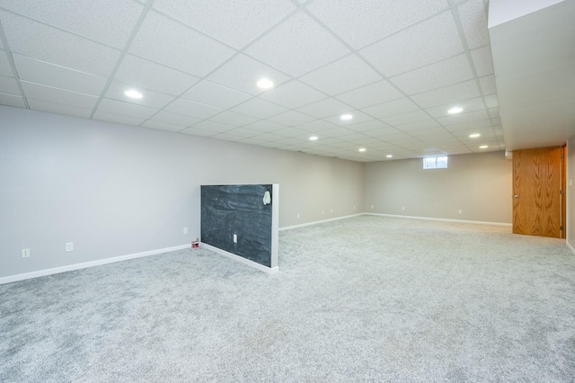 basement featuring carpet flooring