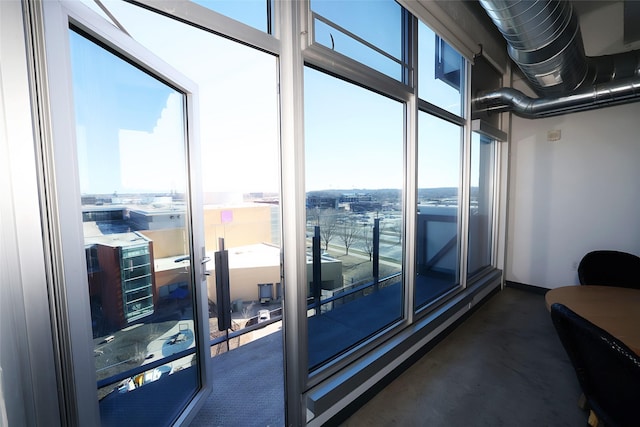 interior space featuring floor to ceiling windows