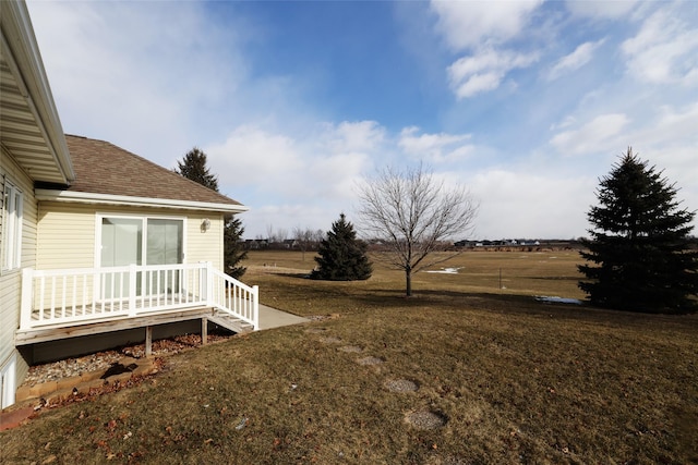 view of yard with a rural view