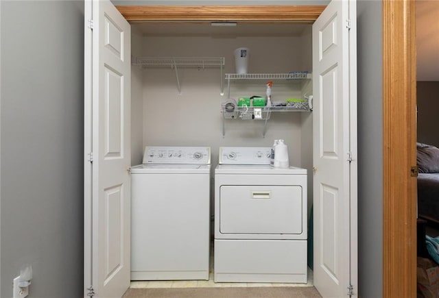 laundry area with washer and dryer