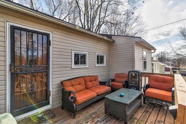 wooden deck with outdoor lounge area