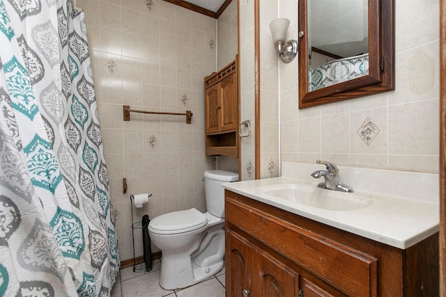 bathroom with tile patterned floors, tile walls, a shower with curtain, toilet, and vanity