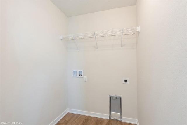 washroom with wood finished floors, hookup for a washing machine, hookup for an electric dryer, baseboards, and laundry area